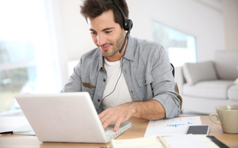 Man working from home with laptop Man working from home with laptop